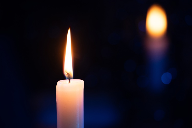 Lit memorial candle representing loss, remembrance, and wrongful death claims after a fatal truck accident in Abbeville, South Carolina