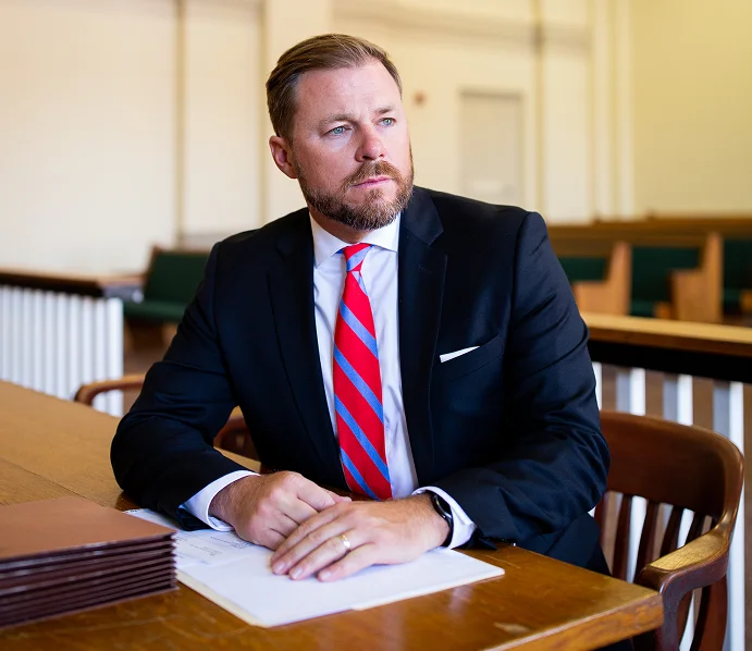 An attorney looking serious during a nursing home abuse trial.