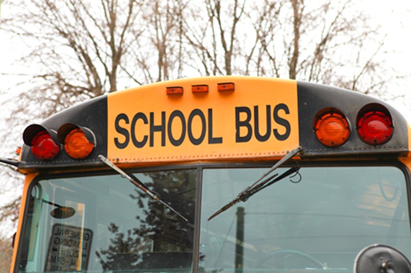 Closeup of the front of a yellow school bus