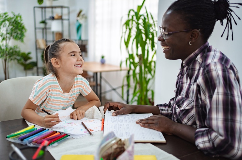 A state employee conducting an interview with a child.